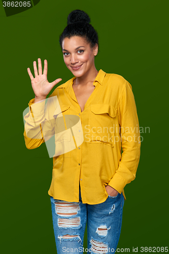 Image of Woman showing five fingers