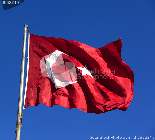 Image of Turkish flag and blue clear sky