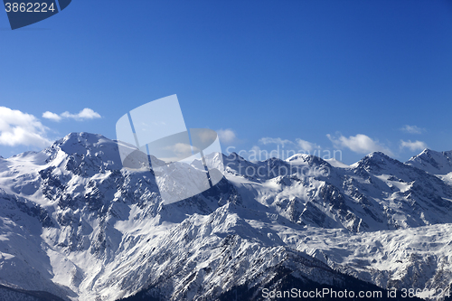 Image of View on snowy mountains in nice sunny day