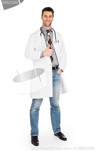 Image of Happy male doctor showing thumb up