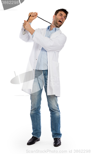 Image of Humorous portrait of a young depressed suicidal surgeon with a s