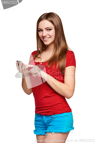 Image of Woman using her cell phone