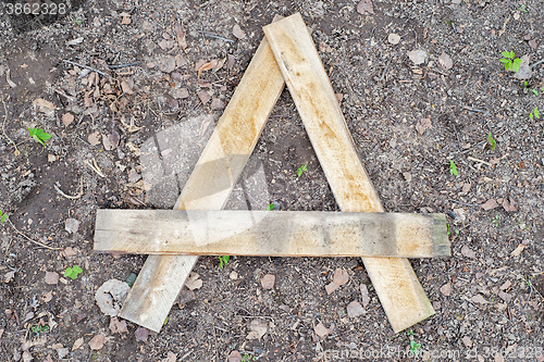 Image of Letter A made of wooden planks 