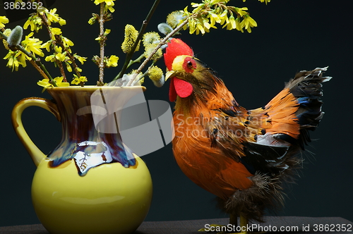 Image of chicken with vase
