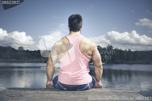 Image of bodybuilding man back side