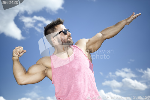 Image of strong fit man posing