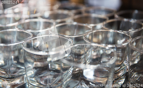 Image of close up of empty clean glasses set at restaurant