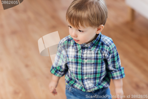 Image of happy little baby boy at home