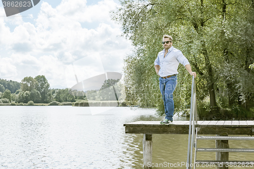 Image of man at the lake