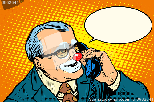 Image of boss clown on the phone