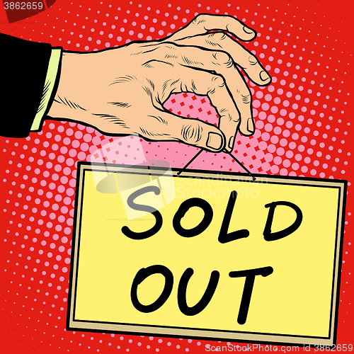 Image of Hand holding a sign sold out