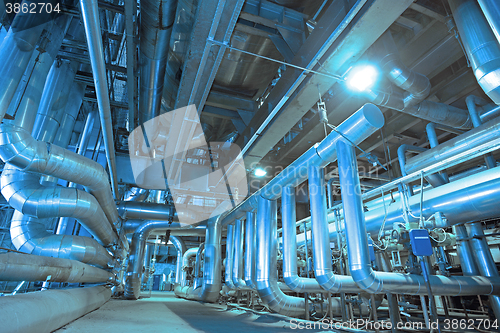 Image of Industrial zone, Steel pipelines, valves, cables and walkways