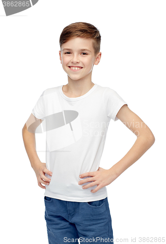 Image of happy boy in white t-shirt and jeans