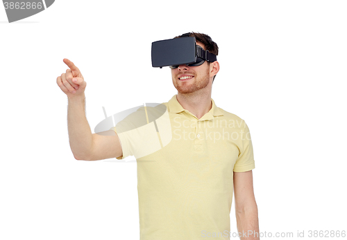 Image of happy man in virtual reality headset or 3d glasses