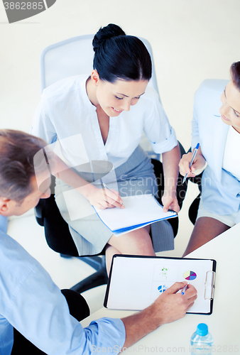 Image of business team having discussion in office