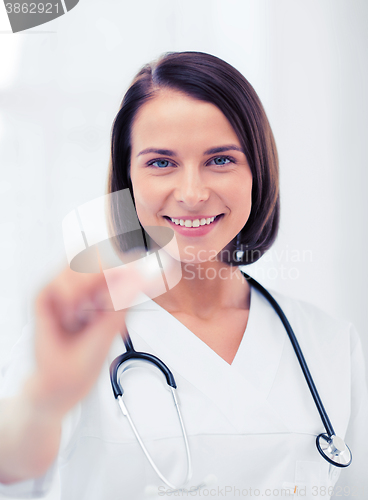 Image of doctor with tablet in hospital