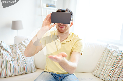 Image of young man in virtual reality headset or 3d glasses