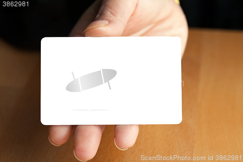 Image of Hand Holding Blank Credit Card