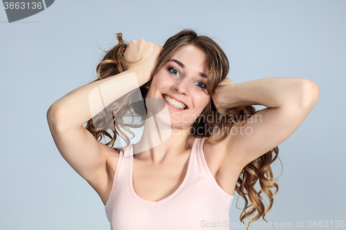 Image of The young woman\'s portrait with happy emotions