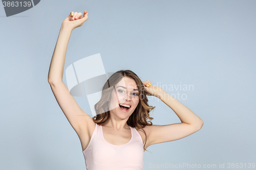 Image of The young woman\'s portrait with happy emotions