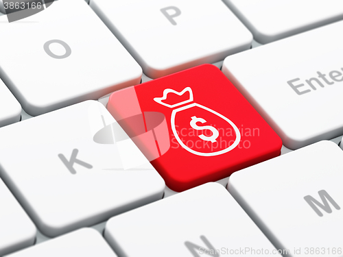 Image of Banking concept: Money Bag on computer keyboard background