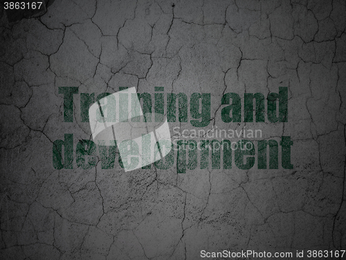 Image of Studying concept: Training and Development on grunge wall background