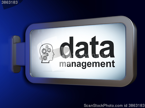 Image of Data concept: Data Management and Head With Gears on billboard background