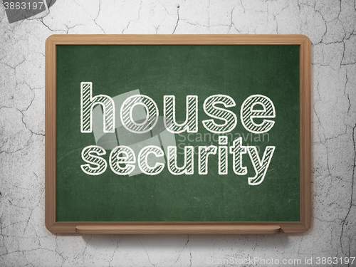 Image of Privacy concept: House Security on chalkboard background