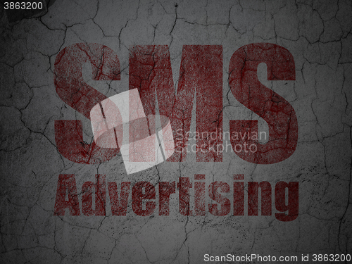 Image of Advertising concept: SMS Advertising on grunge wall background