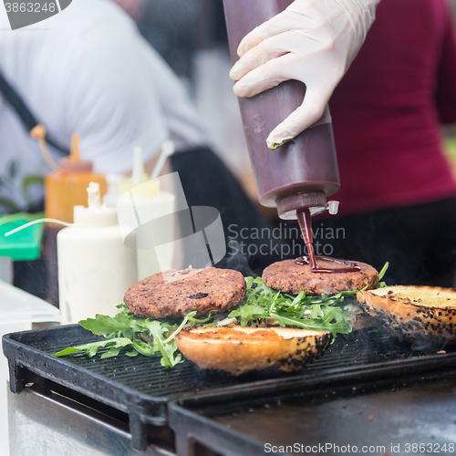 Image of Beef burgers ready to serve on food stall.