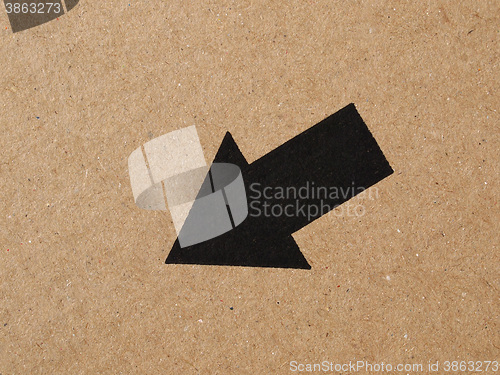 Image of Black arrow on cardboard
