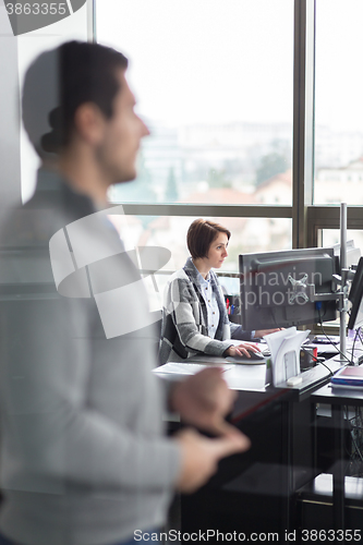 Image of Personal assistant working in corporate office.