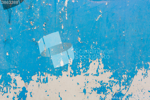 Image of Old blue cracked paint on metal background