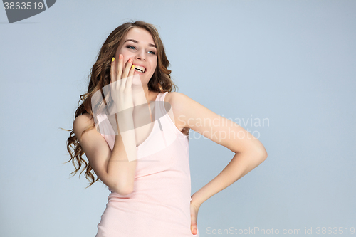 Image of The young woman\'s portrait with happy emotions