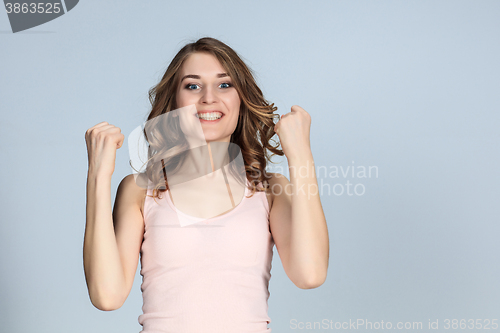 Image of The young woman\'s portrait with happy emotions