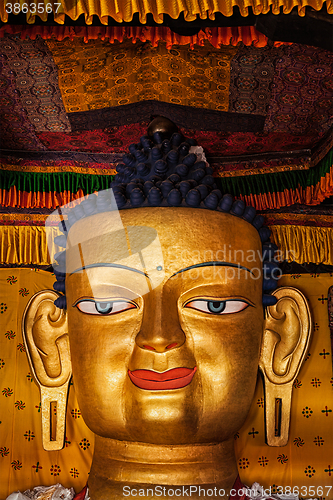 Image of Sakyamuni Buddha statue face close up