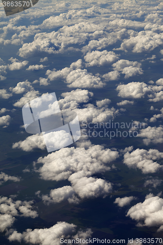 Image of Top view on clouds and fields