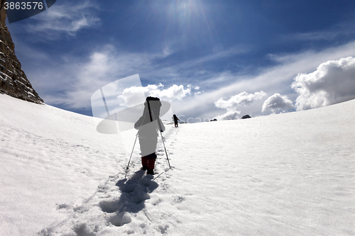 Image of Two hikers on snow plateau