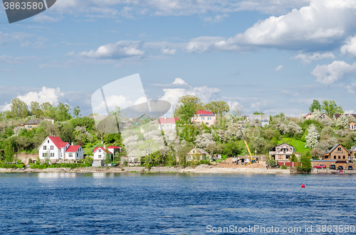 Image of View of the Ivangorod, Narva river embankment in spring day