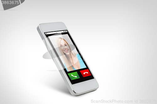 Image of close up of smarthphone with incoming call