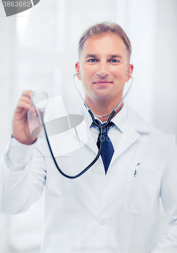 Image of young male doctor with stethoscope