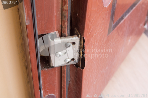 Image of Torn metal hinged doors cheap