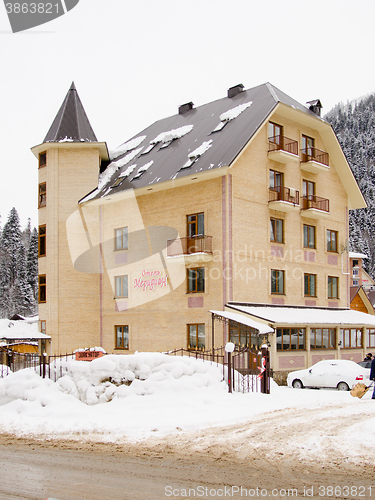 Image of Dombay, Russia - February 7, 2015: The hotel \"Meridian\" is located in the small town of Dombay