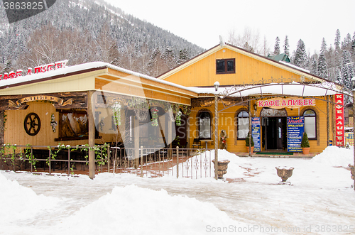 Image of Dombay, Russia - 7 February 2015: Cafe \"Alibek\", located in the small town of Dombay