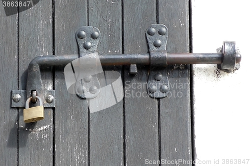 Image of Old latch and padlock