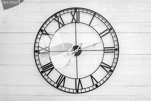 Image of Black clock on white background
