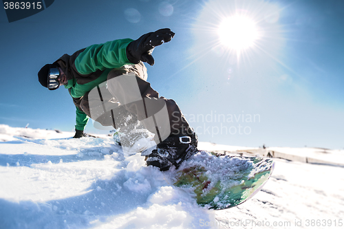 Image of Snowboard freerider in the mountains