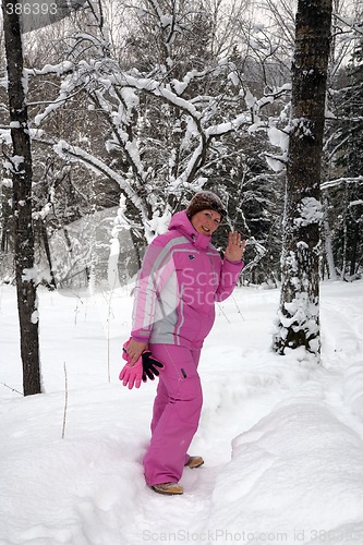 Image of Women in the winter forest.