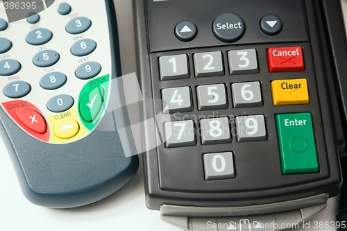 Image of Credit card terminal.