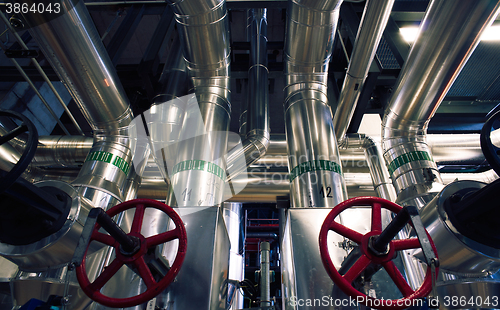 Image of Equipment, cables and piping as found inside of a modern industr